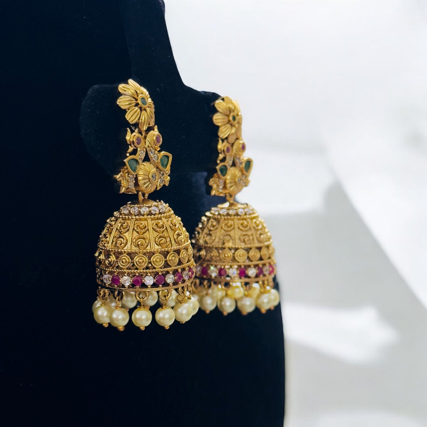 Floral Peacock engraved Jhumka with Pearls