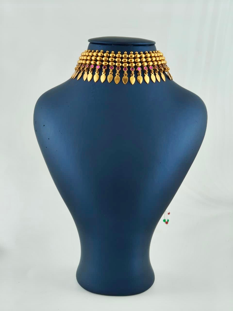 Beautiful Elakkathali in ruby stones