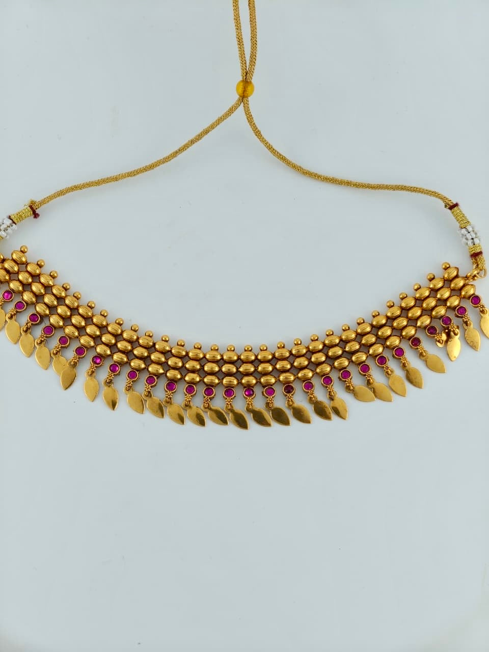 Beautiful Elakkathali in ruby stones